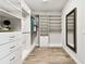 Bright walk-in closet with ample storage space at 5226 Lake Venice Dr, Wimauma, FL 33598