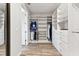 Spacious walk-in closet with ample shelving and drawers at 5226 Lake Venice Dr, Wimauma, FL 33598