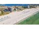 Aerial view of the building and surrounding beach at 5396 Gulf Blvd # 605, St Pete Beach, FL 33706
