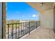 Private balcony overlooking the parking lot and ocean at 5396 Gulf Blvd # 605, St Pete Beach, FL 33706