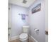Small bathroom with toilet and shower at 5396 Gulf Blvd # 605, St Pete Beach, FL 33706