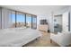 Bright bedroom with ocean view, tiled floors, and ample closet space at 5396 Gulf Blvd # 605, St Pete Beach, FL 33706