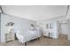 Main bedroom with ocean view and tiled floor at 5396 Gulf Blvd # 605, St Pete Beach, FL 33706
