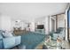 Open concept living room with ocean views at 5396 Gulf Blvd # 605, St Pete Beach, FL 33706