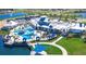 Community clubhouse with resort-style pool and lake views at 5519 Blue Crush Bnd, Land O Lakes, FL 34638