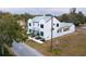 Modern two-story home situated in a residential neighborhood at 5980 Central Ave, New Port Richey, FL 34653