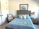 Cozy bedroom with a rustic bed frame and calming decor at 5980 Central Ave, New Port Richey, FL 34653