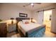 Spacious bedroom with a comfortable bed and ensuite bathroom at 5980 Central Ave, New Port Richey, FL 34653
