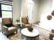 Elegant living room with comfortable seating and stylish decor at 5980 Central Ave, New Port Richey, FL 34653