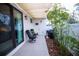 Private patio with seating, grill, and lush bamboo plants at 5980 Central Ave, New Port Richey, FL 34653