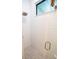 Modern shower with white subway tile and a frameless glass door at 5980 Central Ave, New Port Richey, FL 34653