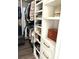Spacious walk-in closet with ample shelving and hanging space at 5980 Central Ave, New Port Richey, FL 34653