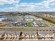 Community aerial view featuring townhomes, landscaping, roads and parking at 6324 Camino Dr, Apollo Beach, FL 33572