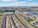 An aerial shows desirable townhomes close to parks, restaurants, and commercial centers at 6324 Camino Dr, Apollo Beach, FL 33572