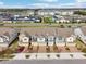 Aerial view of the community showcasing townhomes, amenities, and parking at 6324 Camino Dr, Apollo Beach, FL 33572