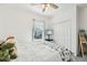 Cozy bedroom with a window view, featuring a soft bed and plush accents at 6324 Camino Dr, Apollo Beach, FL 33572
