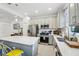 Well-equipped kitchen with stainless appliances, center island, and open layout connecting to the living area at 6324 Camino Dr, Apollo Beach, FL 33572