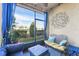 Inviting screened patio with comfortable seating, stylish decor, and views of the backyard at 6324 Camino Dr, Apollo Beach, FL 33572