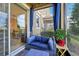Inviting screened patio with comfortable seating, stylish decor, and views of the exterior at 6324 Camino Dr, Apollo Beach, FL 33572