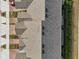 Aerial rooftop perspective showing well-maintained roofing, landscaping, and a glimpse of surrounding neighborhood streets at 6324 Camino Dr, Apollo Beach, FL 33572