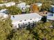 Aerial view of the building, highlighting its rear and landscaping at 7240 E Bank Dr # 204, Tampa, FL 33617