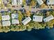 Wide aerial view of the community and lakefront location at 7240 E Bank Dr # 204, Tampa, FL 33617