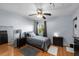 Cozy bedroom with gray bedding and ample closet space at 7240 E Bank Dr # 204, Tampa, FL 33617