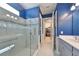 Elegant bathroom with a walk-in shower and a large closet at 727 Winterside Dr, Apollo Beach, FL 33572