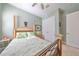 Bright bedroom with a double bed and built-in closet at 727 Winterside Dr, Apollo Beach, FL 33572