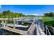 Private boat docks with multiple covered slips and calm water views at 727 Winterside Dr, Apollo Beach, FL 33572