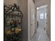 Laundry room with access from hallway and bar cart at 727 Winterside Dr, Apollo Beach, FL 33572