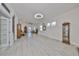Bright and airy living room with hardwood floors and large windows at 727 Winterside Dr, Apollo Beach, FL 33572