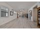 Spacious living room with light wood floors and open floor plan at 727 Winterside Dr, Apollo Beach, FL 33572