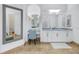 Bright bathroom with vanity, mirror, and view into another room at 751 34Th Ne Ave, St Petersburg, FL 33704
