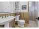 Elegant bathroom with a walk-in shower and updated fixtures at 751 34Th Ne Ave, St Petersburg, FL 33704