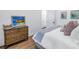 Serene bedroom featuring a dresser and striped bedding at 751 34Th Ne Ave, St Petersburg, FL 33704
