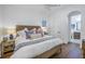 Spacious bedroom with king-size bed and ensuite bathroom access at 751 34Th Ne Ave, St Petersburg, FL 33704