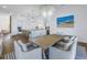 Spacious dining area with hardwood floors and stylish chandelier at 751 34Th Ne Ave, St Petersburg, FL 33704