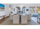 Bright dining room with large chandelier and water views at 751 34Th Ne Ave, St Petersburg, FL 33704