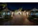 Eveningexterior of house with brick driveway and palm trees at 751 34Th Ne Ave, St Petersburg, FL 33704