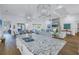Island kitchen open to living area with granite and hardwood floors at 751 34Th Ne Ave, St Petersburg, FL 33704