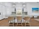Modern kitchen with large island and light wood cabinets at 751 34Th Ne Ave, St Petersburg, FL 33704