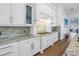 Spacious kitchen with white cabinets, granite countertops, and stainless steel appliances at 751 34Th Ne Ave, St Petersburg, FL 33704