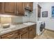 Laundry room with washer, dryer, and ample counter space at 751 34Th Ne Ave, St Petersburg, FL 33704