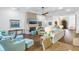 Living room boasts hardwood floors and a cozy fireplace at 751 34Th Ne Ave, St Petersburg, FL 33704