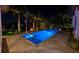 Blue illuminated pool at night, perfect for evening swims at 751 34Th Ne Ave, St Petersburg, FL 33704