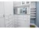 Custom designed walk-in closet with shelving and drawers at 751 34Th Ne Ave, St Petersburg, FL 33704