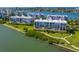 Aerial view of waterfront condos with lush landscaping at 8001 Sailboat Key S Blvd # 202, St Pete Beach, FL 33707