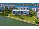 Aerial view of waterfront condos with lush landscaping at 8001 Sailboat Key S Blvd # 202, St Pete Beach, FL 33707