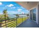 Spacious balcony with scenic waterfront views at 8001 Sailboat Key S Blvd # 202, St Pete Beach, FL 33707